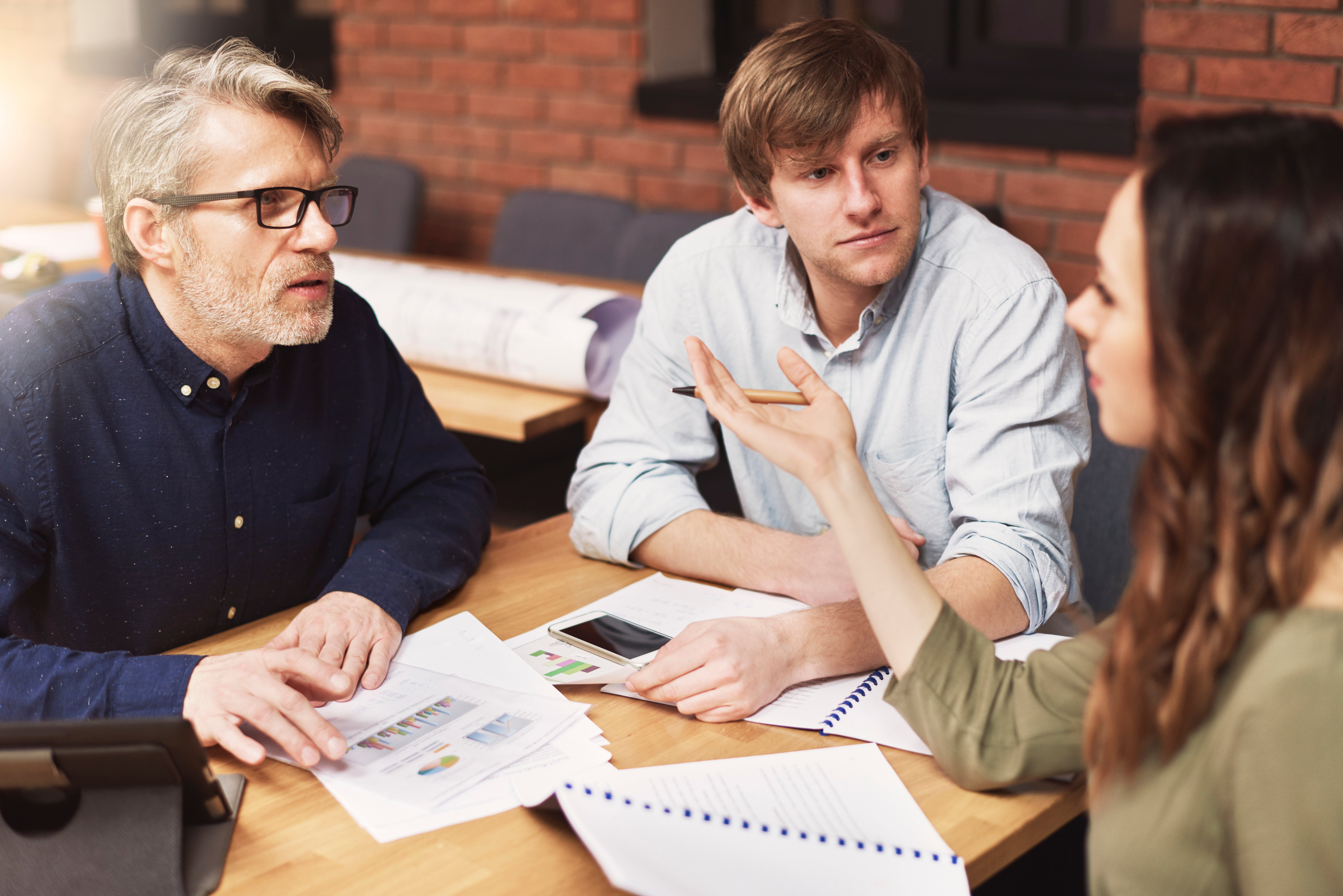 group-creative-people-analyzing-result-work